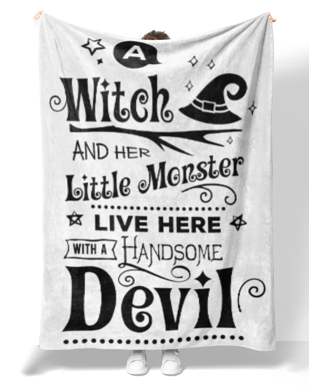 A Witch and her little monster live here with a handsome devil