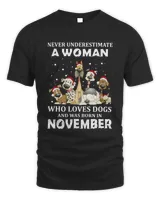 Never Underestimate A Woman Who Loves Dogs And Was Born In November Christmas Shirt
