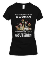 Never Underestimate A Woman Who Loves Dogs And Was Born In November Christmas Shirt