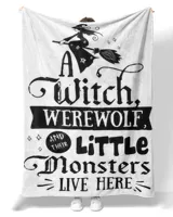 A witch, werewoft and their little monsters live here Funny halloween quote