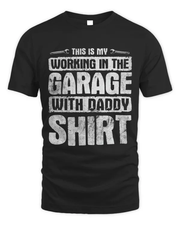 Car Mechanic Working In The Garage With Daddy