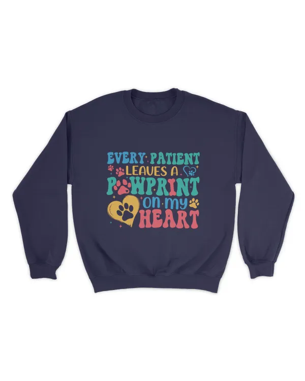 Every patient leaves a pawprint on my heart shirt